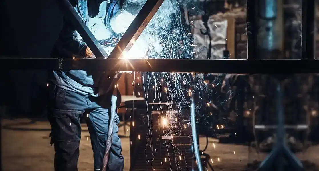 Structural steel fabricator working on construction project