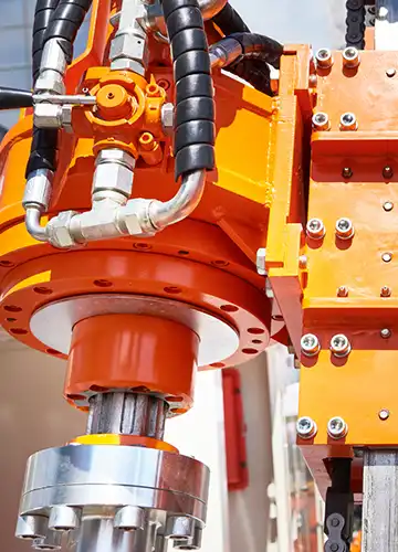 Overheated hydraulic hose showing cracks and wear