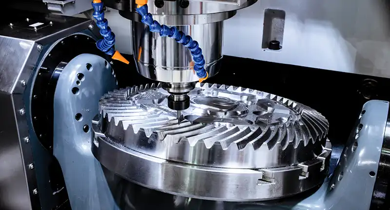 CNC plasma cutter slicing through thick steel with a focused plasma arc.