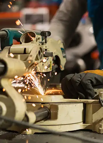 Skilled fabricator working on custom metal project in Dubai