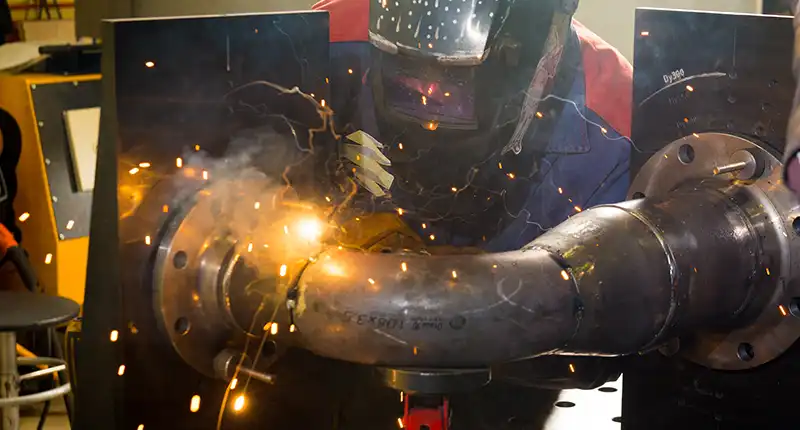 Waterjet cutter shaping metal for industrial projects in Dubai