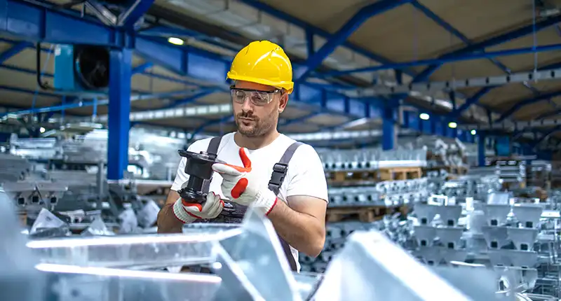 Professional metal fabrication workshop in Dubai showing CNC machining and precision tools for ISO 9001 certified quality control