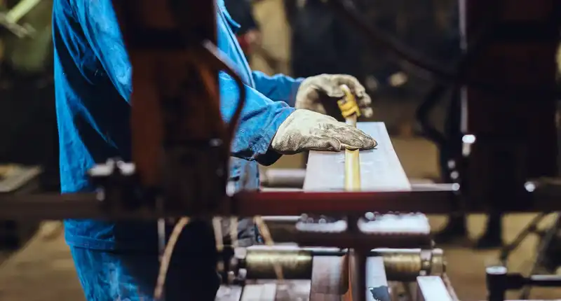 engineers are working in metal machining company