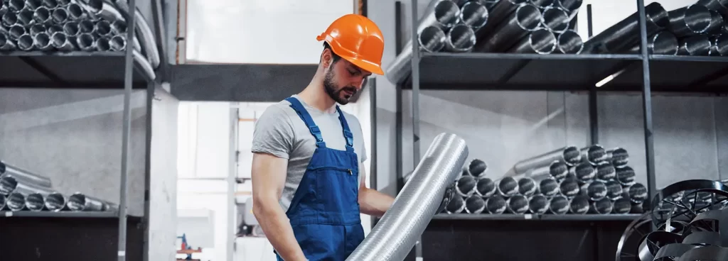 Skilled technicians performing metal fabrication services UAE