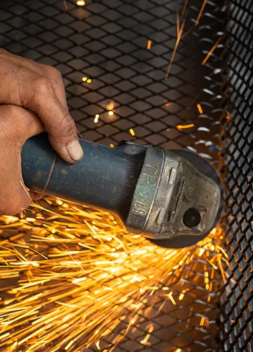 Skilled technicians working at a certified metal fabrication facility in Dubai