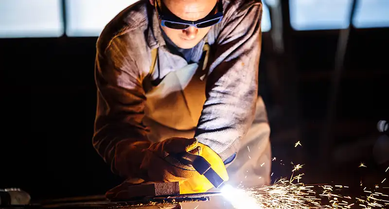 UAE skyscraper construction site using certified metal fabrication components from ISO 9001 compliant supplier